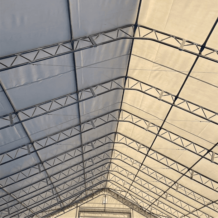Chery Industrial Gold Mountain Double Truss Storage Shelter 70′ W × 120′ L × 28′ H